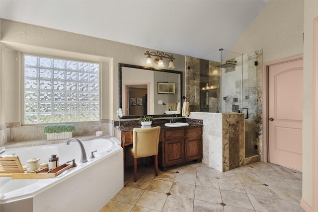 217 Silver Rose Blvd, Burleson, TX 76028 - full bathroom featuring vanity, a garden tub, a shower stall, vaulted ceiling, and tile patterned flooring
