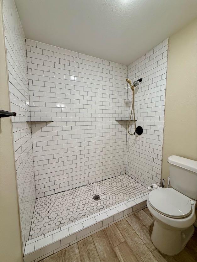 11720 Lavender Ave, Azle, TX 76020 - full bathroom with a shower stall and wood finished floors
