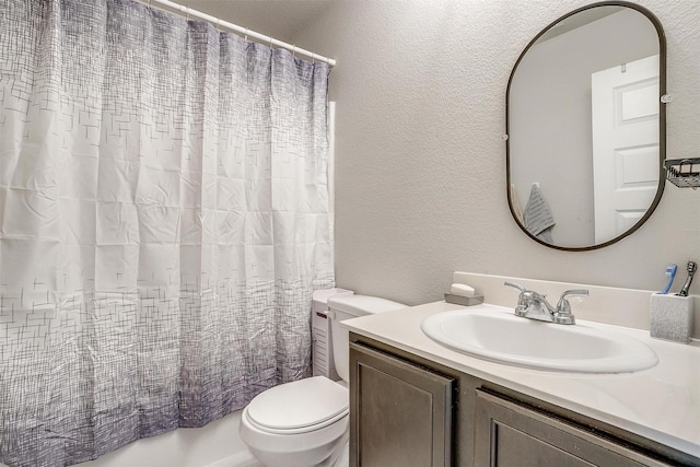 2604 Norite Dr, Fort Worth, TX 76108 - full bath with vanity, toilet, a textured wall, and shower / bathtub combination with curtain