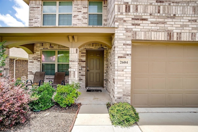 2604 Norite Dr, Fort Worth, TX 76108 - doorway to property featuring a garage and a porch