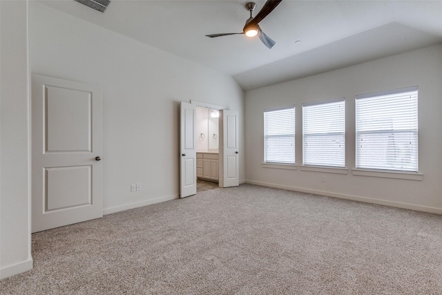 928 Marian Dr, Allen, TX 75013 - unfurnished bedroom featuring light carpet, lofted ceiling, baseboards, and a ceiling fan
