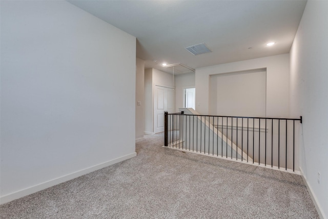 928 Marian Dr, Allen, TX 75013 - carpeted empty room featuring attic access, baseboards, and recessed lighting