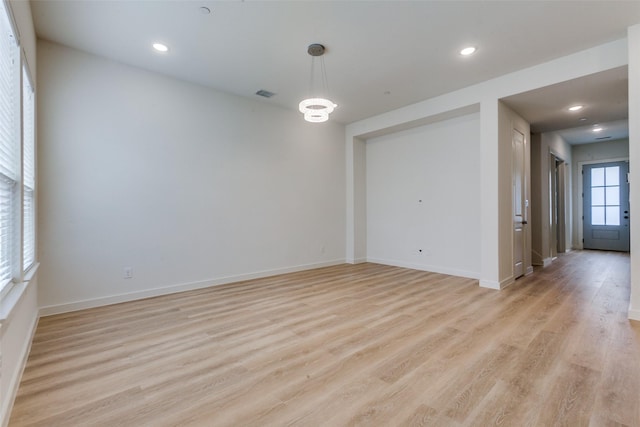928 Marian Dr, Allen, TX 75013 - empty room with light wood-type flooring, baseboards, and recessed lighting