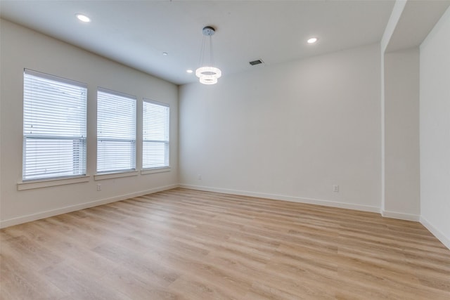 928 Marian Dr, Allen, TX 75013 - spare room with light wood-style flooring, baseboards, a chandelier, and recessed lighting