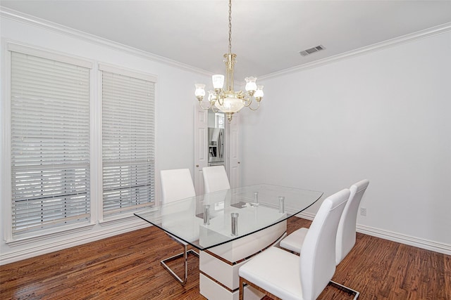 3308 Corn Valley Rd, Grand Prairie, TX 75052 - dining area with a chandelier, wood finished floors, crown molding, and baseboards