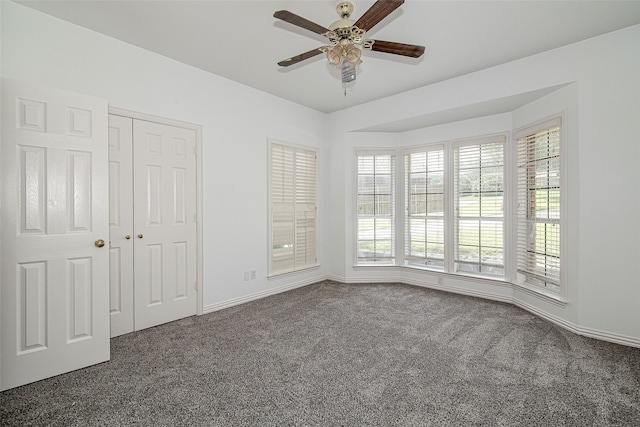 3308 Corn Valley Rd, Grand Prairie, TX 75052 - unfurnished bedroom featuring carpet flooring, baseboards, a closet, and ceiling fan