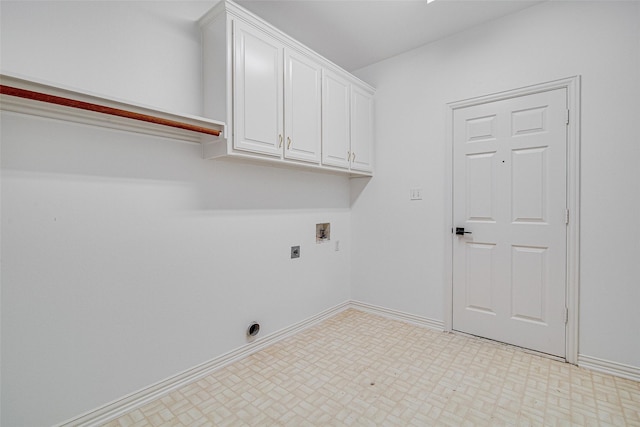 3308 Corn Valley Rd, Grand Prairie, TX 75052 - laundry area with hookup for an electric dryer, washer hookup, baseboards, and cabinet space
