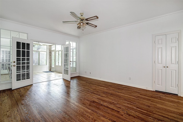 3308 Corn Valley Rd, Grand Prairie, TX 75052 - spare room featuring wood finished floors, a ceiling fan, ornamental molding, and baseboards