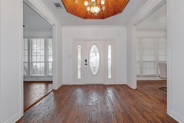 3308 Corn Valley Rd, Grand Prairie, TX 75052 - entryway with a chandelier, wood finished floors, crown molding, and baseboards