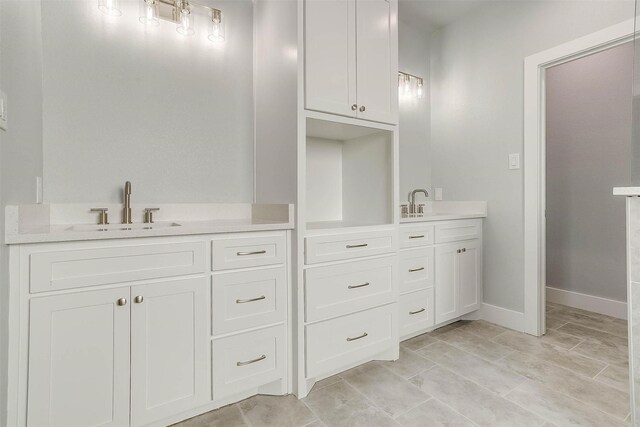 580 Highview Ct, Godley, TX 76044 - bathroom with double vanity and baseboards