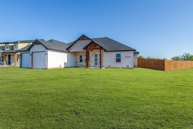 580 Highview Ct, Godley, TX 76044 - view of front facade with an attached garage and stucco siding