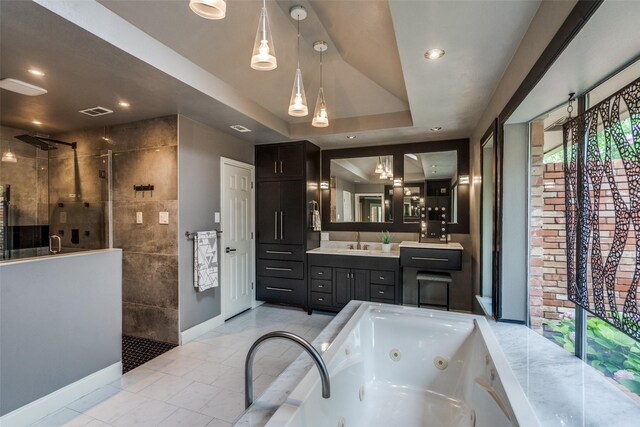 2021 Wing Point Ln, Plano, TX 75093 - full bathroom with walk in shower, a jetted tub, vanity, baseboards, and recessed lighting