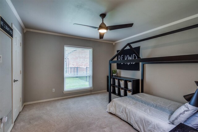 2021 Wing Point Ln, Plano, TX 75093 - carpeted bedroom with ornamental molding, baseboards, and a ceiling fan