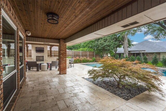2021 Wing Point Ln, Plano, TX 75093 - fenced backyard featuring a fireplace and a patio area