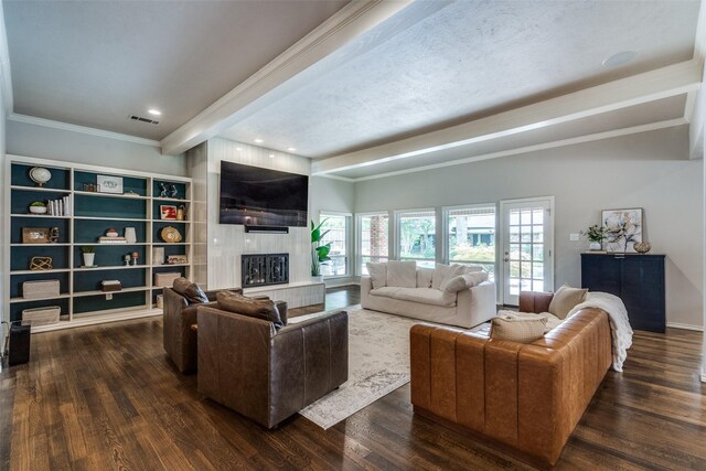 2021 Wing Point Ln, Plano, TX 75093 - living area featuring a large fireplace, wood finished floors, crown molding, beam ceiling, and recessed lighting