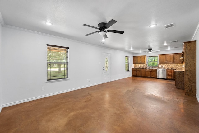 604 Donna Cir, Kerens, TX 75144 - unfurnished living room with a ceiling fan, finished concrete floors, recessed lighting, and crown molding
