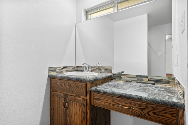 604 Donna Cir, Kerens, TX 75144 - bathroom featuring vanity and a textured wall