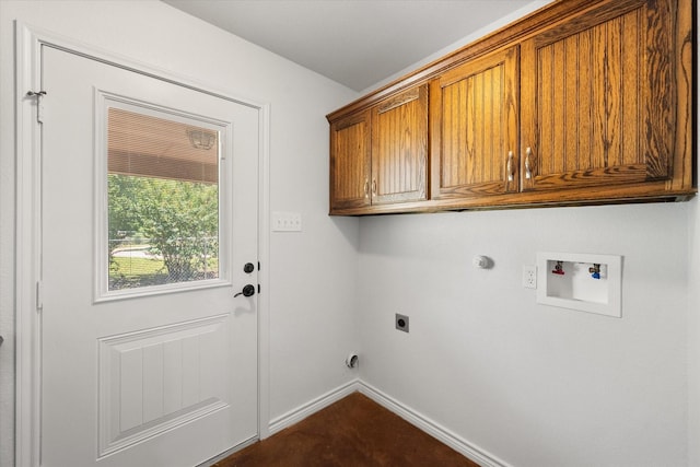 604 Donna Cir, Kerens, TX 75144 - washroom featuring electric dryer hookup, cabinet space, hookup for a washing machine, and gas dryer hookup