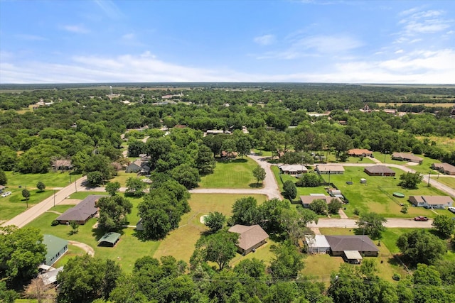 604 Donna Cir, Kerens, TX 75144 - aerial perspective of suburban area featuring a heavily wooded area