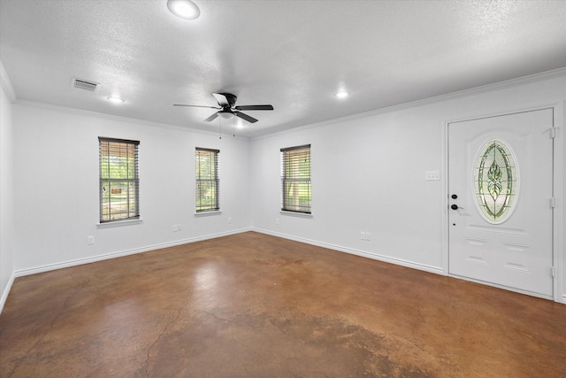 604 Donna Cir, Kerens, TX 75144 - entryway featuring plenty of natural light, a ceiling fan, ornamental molding, concrete flooring, and recessed lighting