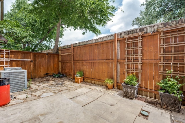 4830 Cedar Springs Rd Unit 12, Dallas, TX 75219 - fenced backyard featuring a patio