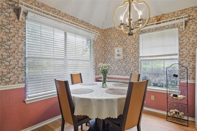 111 Christopher Dr, Cooper, TX 75432 - dining area featuring wallpapered walls, a chandelier, wood finished floors, baseboards, and wainscoting
