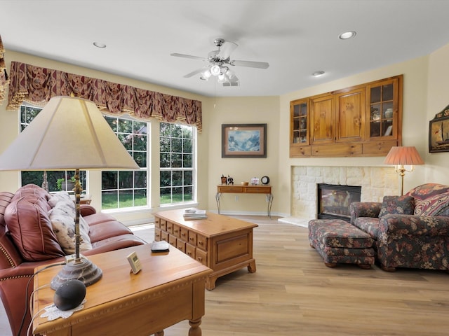 2832 Lincolnshire Dr, Richardson, TX 75082 - living room with a ceiling fan, light wood-type flooring, a fireplace, recessed lighting, and baseboards