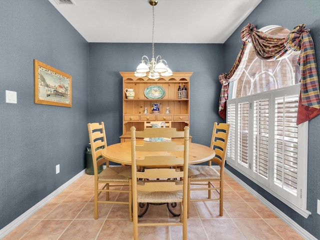 2832 Lincolnshire Dr, Richardson, TX 75082 - dining room with a chandelier, light tile patterned flooring, and baseboards