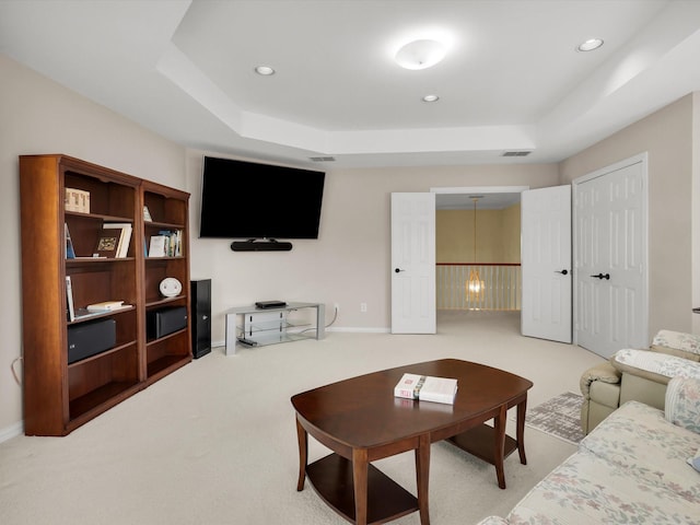 2832 Lincolnshire Dr, Richardson, TX 75082 - carpeted living area featuring a raised ceiling, recessed lighting, and baseboards