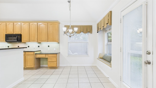 1424 Charleston Dr, Allen, TX 75002 - kitchen featuring black microwave, a chandelier, baseboards, pendant lighting, and light brown cabinetry
