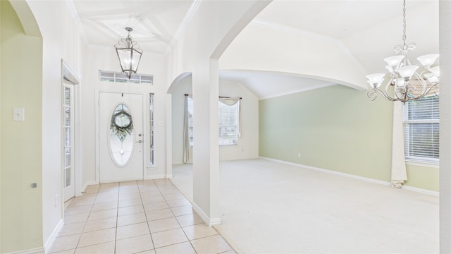 1424 Charleston Dr, Allen, TX 75002 - entrance foyer featuring a chandelier, arched walkways, ornamental molding, baseboards, and vaulted ceiling