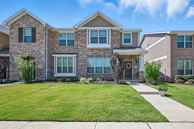 2409 Davenport Dr, Denton, TX 76207 - view of front of house featuring a front lawn and brick siding