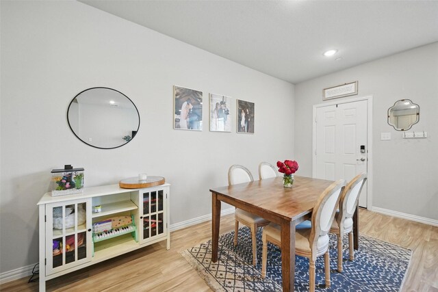2409 Davenport Dr, Denton, TX 76207 - dining space with light wood-type flooring, baseboards, and recessed lighting