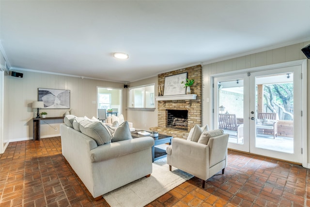 13841 Far Hills Ln, Dallas, TX 75240 - living area featuring plenty of natural light, ornamental molding, brick flooring, wood walls, and a brick fireplace