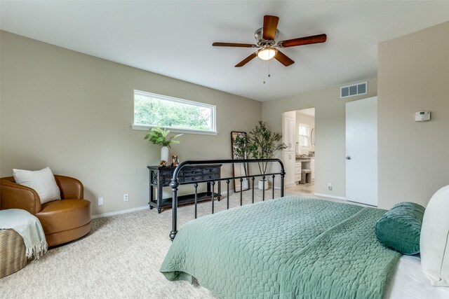 13841 Far Hills Ln, Dallas, TX 75240 - carpeted bedroom featuring ensuite bathroom and ceiling fan