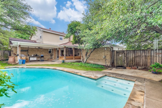 13841 Far Hills Ln, Dallas, TX 75240 - view of swimming pool featuring a patio, a gate, and ceiling fan