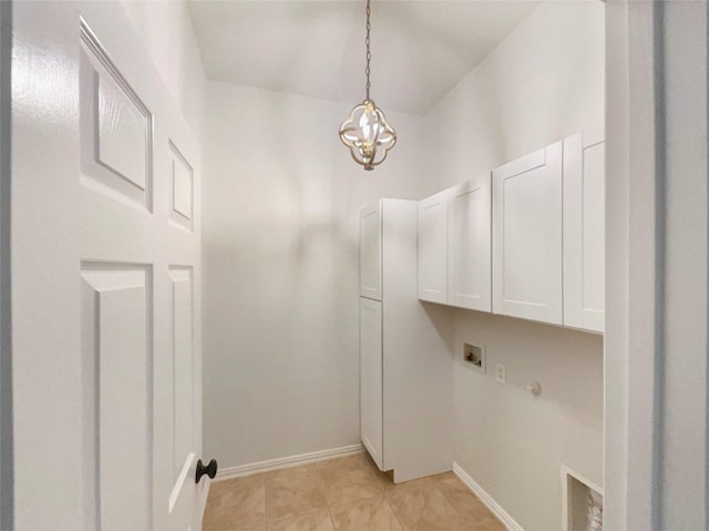 2140 Heather Glen Dr, Rockwall, TX 75087 - laundry room featuring cabinet space, hookup for a washing machine, a chandelier, and baseboards
