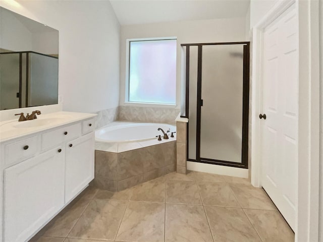 2140 Heather Glen Dr, Rockwall, TX 75087 - bathroom with vanity, a stall shower, a bath, and tile patterned floors
