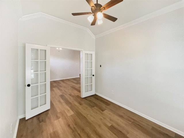 2140 Heather Glen Dr, Rockwall, TX 75087 - spare room featuring french doors, wood finished floors, baseboards, crown molding, and a ceiling fan