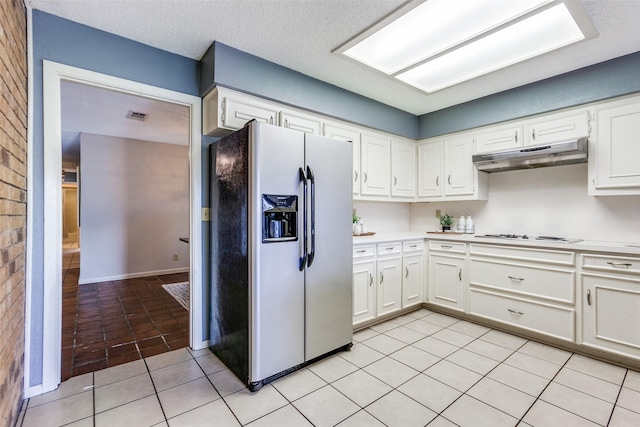 12332 Ferris Creek Ln, Dallas, TX 75243 - kitchen featuring stainless steel refrigerator with ice dispenser, under cabinet range hood, white stovetop, white cabinets, and light countertops