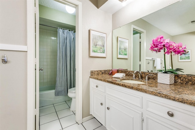 12332 Ferris Creek Ln, Dallas, TX 75243 - full bath featuring vanity, tile patterned flooring, toilet, and shower / bath combo