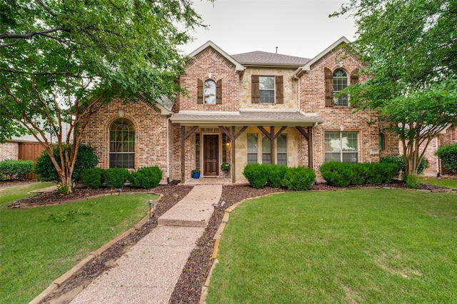 3500 Corkwood Dr, Frisco, TX 75033 - traditional-style home featuring a front lawn, brick siding, and stone siding