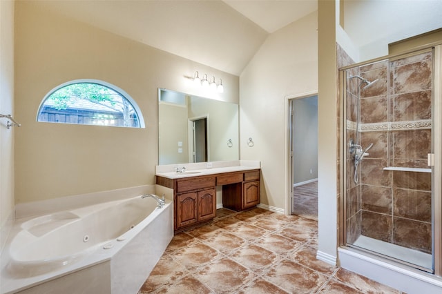 3500 Corkwood Dr, Frisco, TX 75033 - full bathroom with lofted ceiling, vanity, a tub with jets, a shower stall, and tile patterned floors