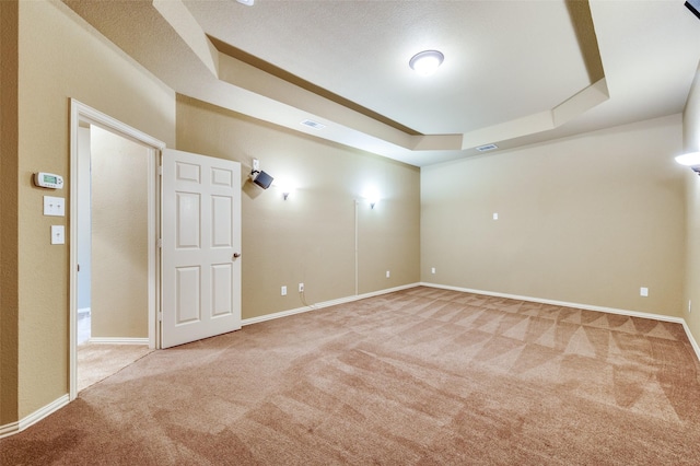 3500 Corkwood Dr, Frisco, TX 75033 - unfurnished room with light carpet, a tray ceiling, and baseboards