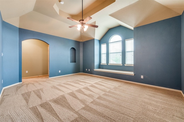 3500 Corkwood Dr, Frisco, TX 75033 - unfurnished room featuring ceiling fan, vaulted ceiling, carpet floors, arched walkways, and baseboards