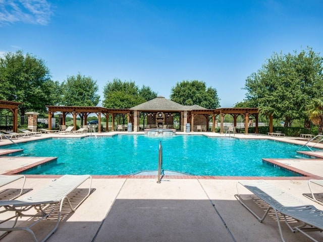 3500 Corkwood Dr, Frisco, TX 75033 - view of swimming pool featuring a pergola, a patio, and a pool with connected hot tub