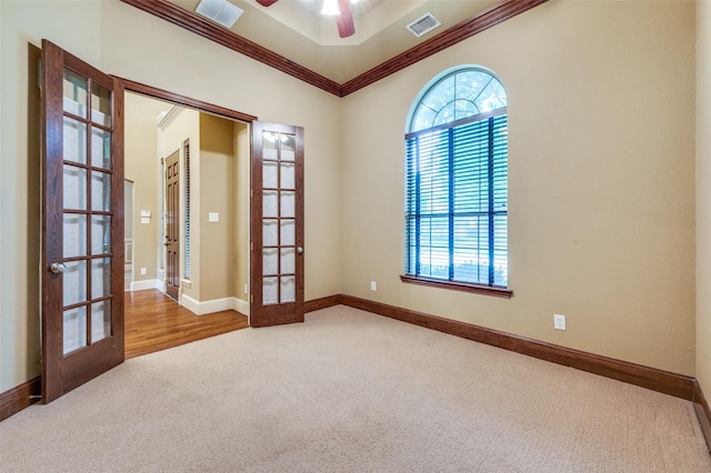 3500 Corkwood Dr, Frisco, TX 75033 - carpeted spare room with french doors, ornamental molding, a ceiling fan, and baseboards