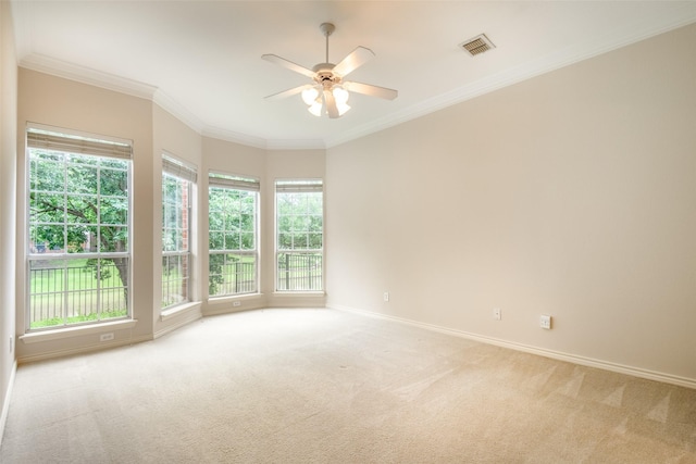 8635 Forest Glen Dr, Irving, TX 75063 - carpeted spare room with baseboards, a ceiling fan, and ornamental molding