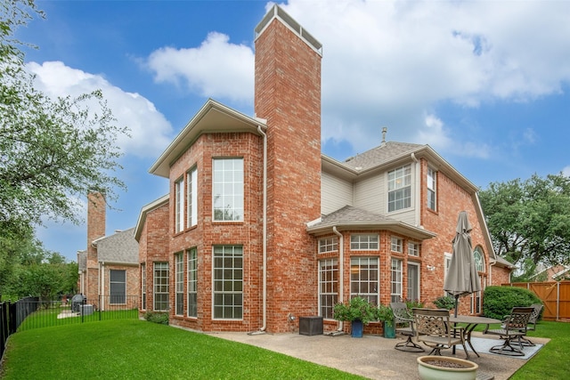 8635 Forest Glen Dr, Irving, TX 75063 - back of house featuring a chimney, a patio, brick siding, and roof with shingles