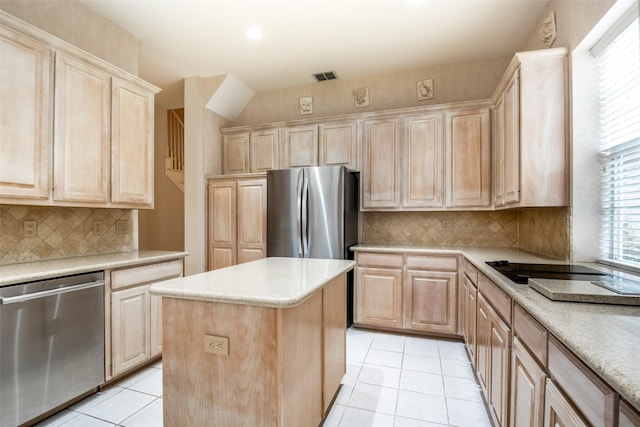8635 Forest Glen Dr, Irving, TX 75063 - kitchen with appliances with stainless steel finishes, light brown cabinets, light tile patterned floors, and light countertops